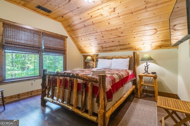 bedroom featuring baseboards, wooden ceiling, wood finished floors, and lofted ceiling