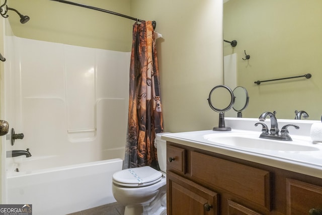 full bath with tile patterned floors, shower / bath combo with shower curtain, toilet, and vanity