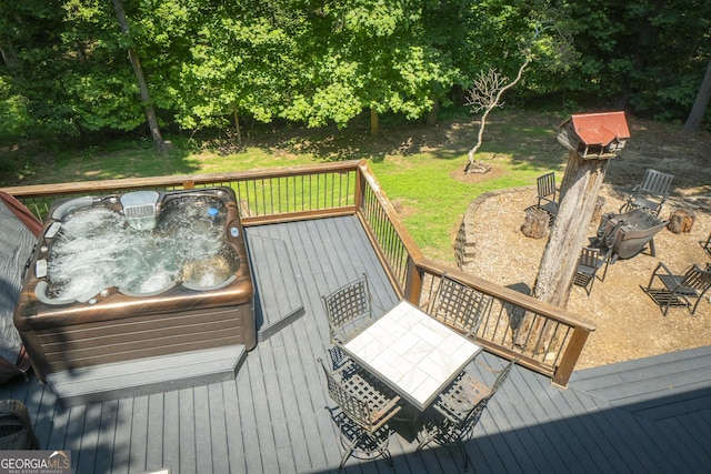 wooden terrace with a yard