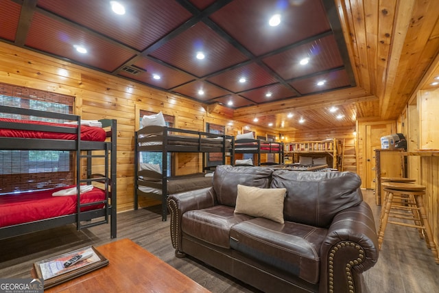 bedroom with wooden walls, recessed lighting, wooden ceiling, and wood finished floors