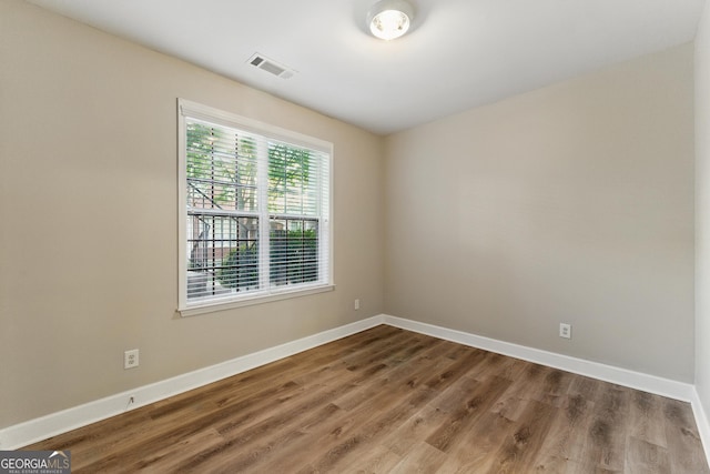 2313 Millhaven St, Smyrna, GA 30080 - spare room featuring visible vents, wood finished floors, and baseboards