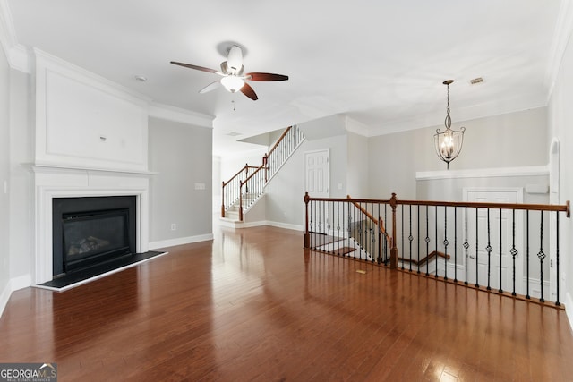 2313 Millhaven St, Smyrna, GA 30080 - bonus room featuring baseboards, wood finished floors, ceiling fan with notable chandelier, and a fireplace