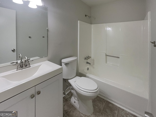 carpeted spare room with baseboards and a ceiling fan