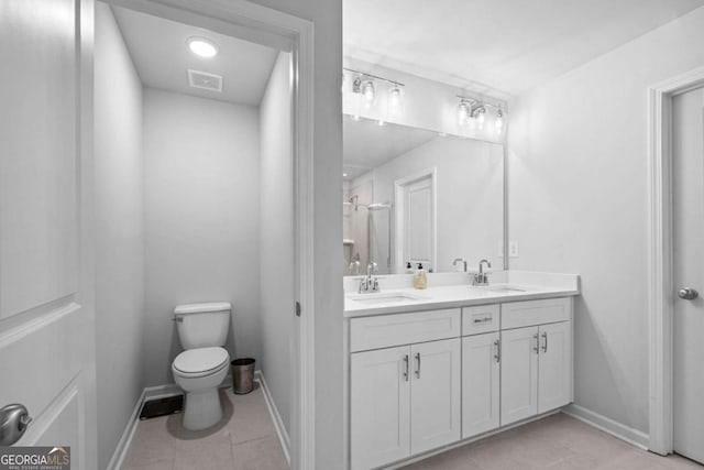 full bathroom featuring a sink, tile patterned flooring, toilet, and visible vents