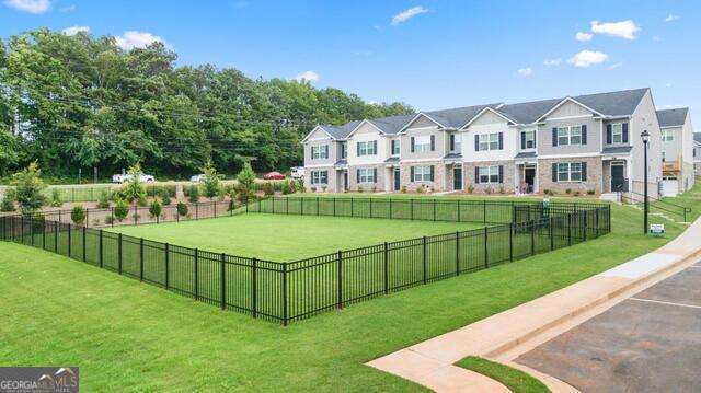 309 Elgin Dr, Lawrenceville, GA 30045 - view of property's community with a yard and fence