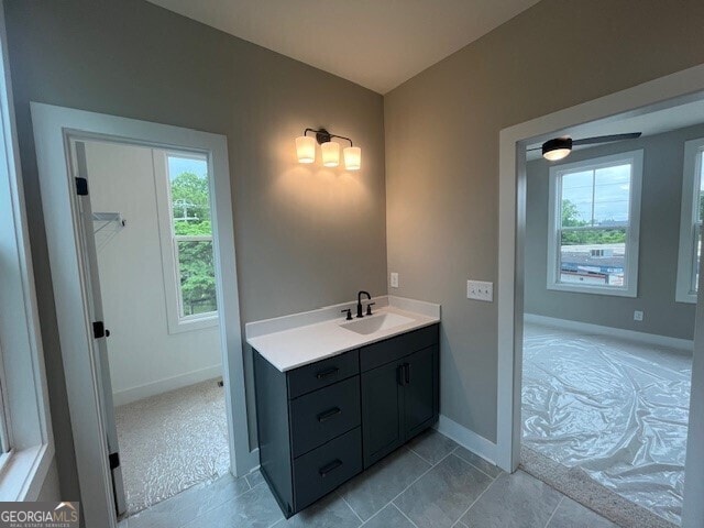 968 Bibbs Cir NW, Atlanta, GA 30318 - bathroom featuring vanity and baseboards