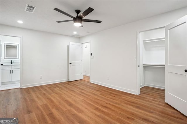 unfurnished bedroom with recessed lighting, visible vents, baseboards, and light wood-style floors