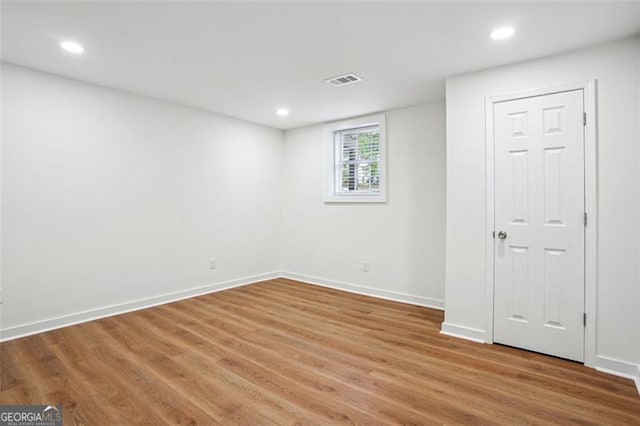 interior space featuring visible vents, baseboards, and light wood-type flooring