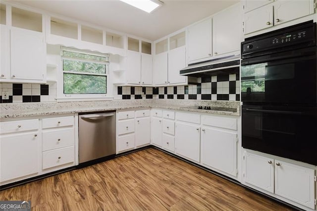 11433 Panhandle Rd, Hampton, GA 30228 - kitchen with black appliances, open shelves, under cabinet range hood, and white cabinetry