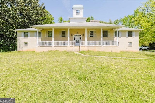 11433 Panhandle Rd, Hampton, GA 30228 - farmhouse-style home with covered porch and a front yard
