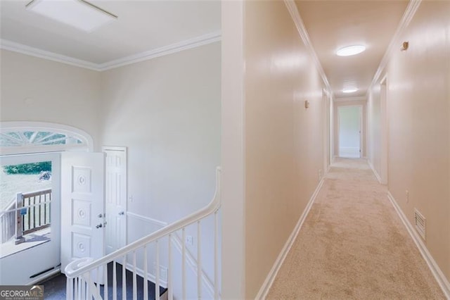 11433 Panhandle Rd, Hampton, GA 30228 - hallway featuring carpet, ornamental molding, an upstairs landing, baseboards, and visible vents