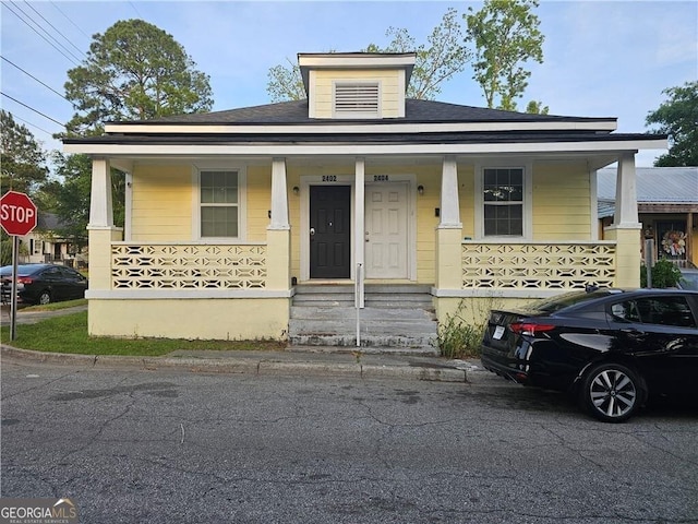 bungalow-style home featuring covered porch