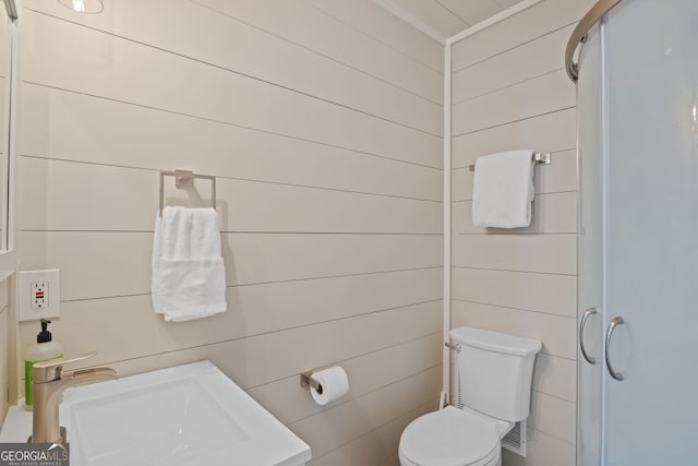 43 Cowan Ct, Mansfield, GA 30055 - bathroom with a sink, toilet, and a stall shower