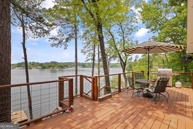 43 Cowan Ct, Mansfield, GA 30055 - wooden deck featuring a water view, a grill, and outdoor dining space