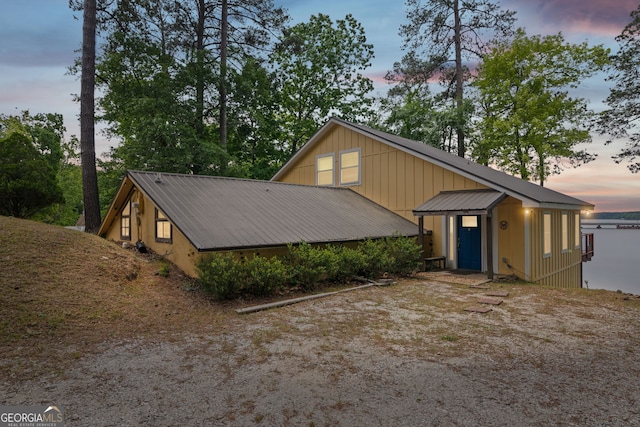 43 Cowan Ct, Mansfield, GA 30055 - view of front facade with metal roof