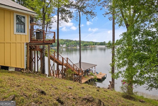 43 Cowan Ct, Mansfield, GA 30055 - dock featuring stairway and a deck with water view