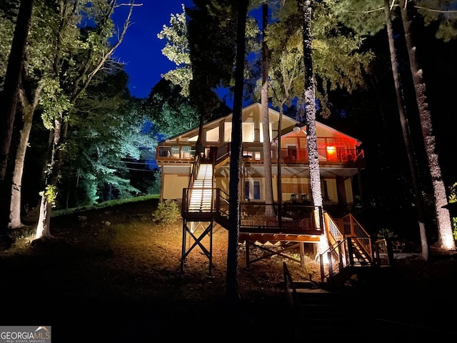 43 Cowan Ct, Mansfield, GA 30055 - playground at twilight with stairs and a deck