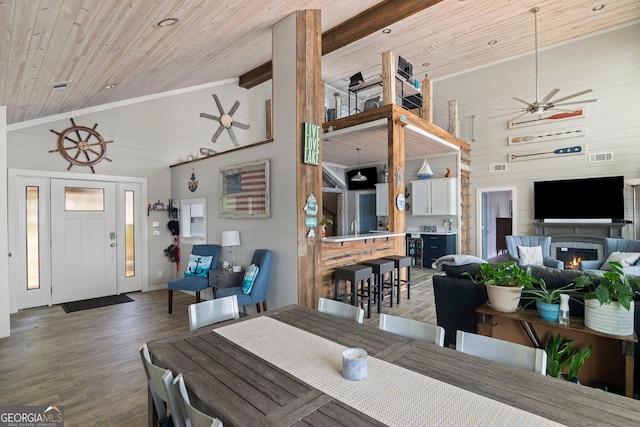 43 Cowan Ct, Mansfield, GA 30055 - dining area featuring wood walls, a ceiling fan, wood finished floors, high vaulted ceiling, and wooden ceiling