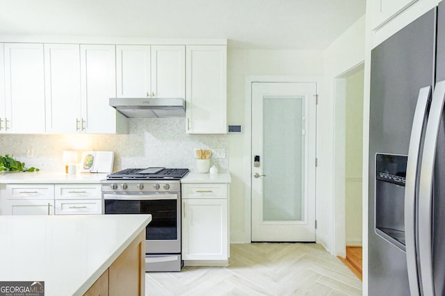 kitchen featuring light countertops, stainless steel appliances, white cabinetry, and under cabinet range hood