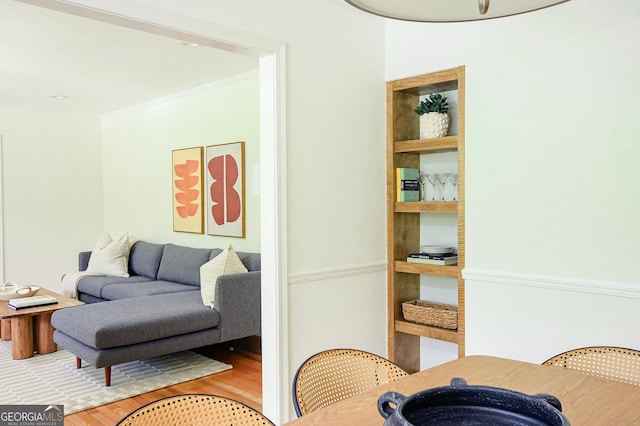 sitting room featuring wood finished floors