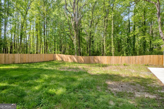view of yard with fence