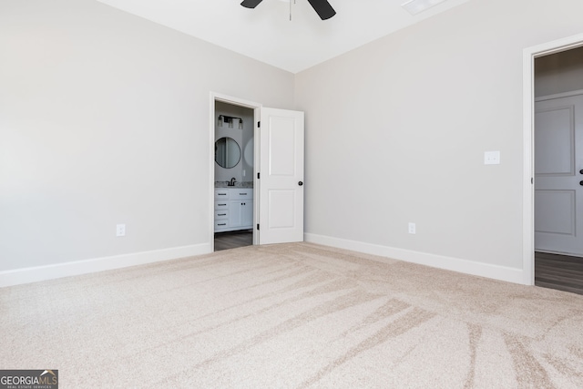 516 Branch St, Cedartown, GA 30125 - unfurnished bedroom featuring ensuite bath, ceiling fan, carpet floors, and baseboards