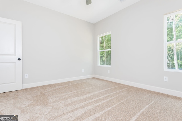 516 Branch St, Cedartown, GA 30125 - carpeted spare room featuring a healthy amount of sunlight, a ceiling fan, and baseboards