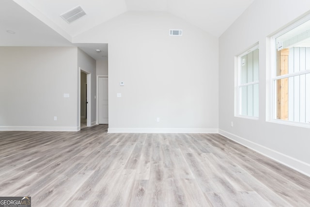516 Branch St, Cedartown, GA 30125 - unfurnished room featuring visible vents, light wood-type flooring, and vaulted ceiling