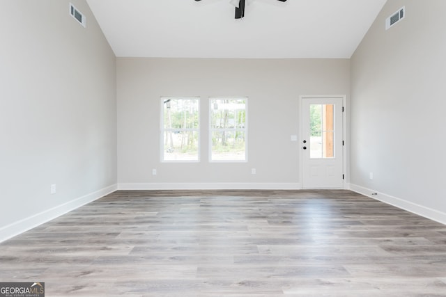 516 Branch St, Cedartown, GA 30125 - spare room featuring visible vents, ceiling fan, vaulted ceiling, and baseboards