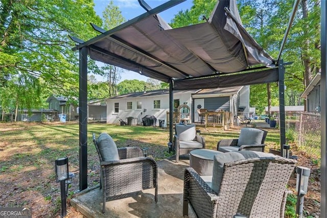 view of patio / terrace with outdoor lounge area and fence