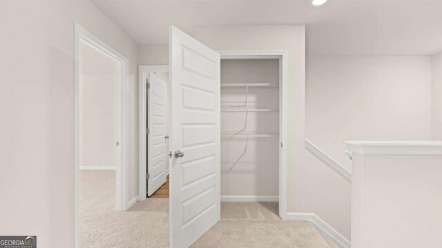 322 Sound Cir Unit 118, Stockbridge, GA 30281 - unfurnished bedroom featuring light colored carpet and baseboards