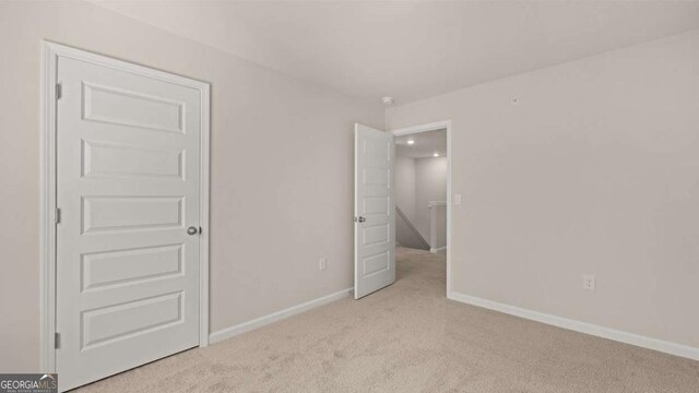322 Sound Cir Unit 118, Stockbridge, GA 30281 - back of property with central AC, fence, a shingled roof, and a lawn