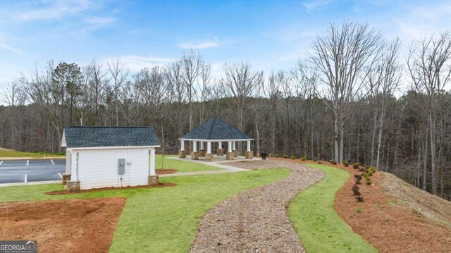 322 Sound Cir Unit 118, Stockbridge, GA 30281 - surrounding community with a wooded view, a gazebo, and playground community