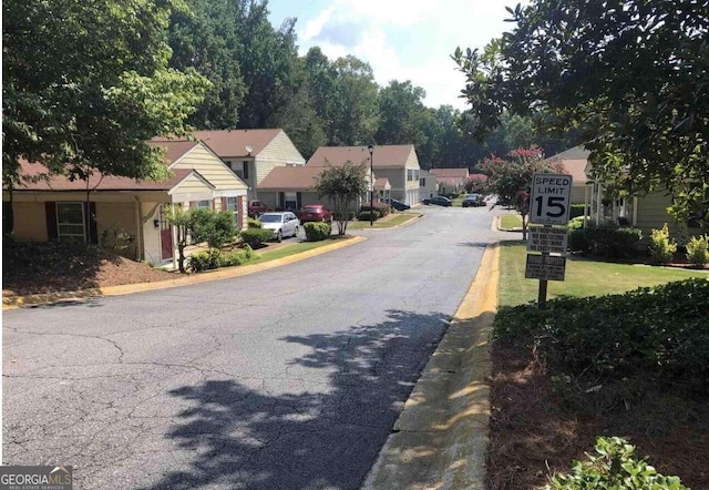 1304 Old Coach Rd SW, Marietta, GA 30008 - view of road featuring a residential view and curbs