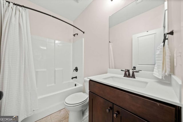 full bathroom featuring vanity, toilet, and shower / tub combo