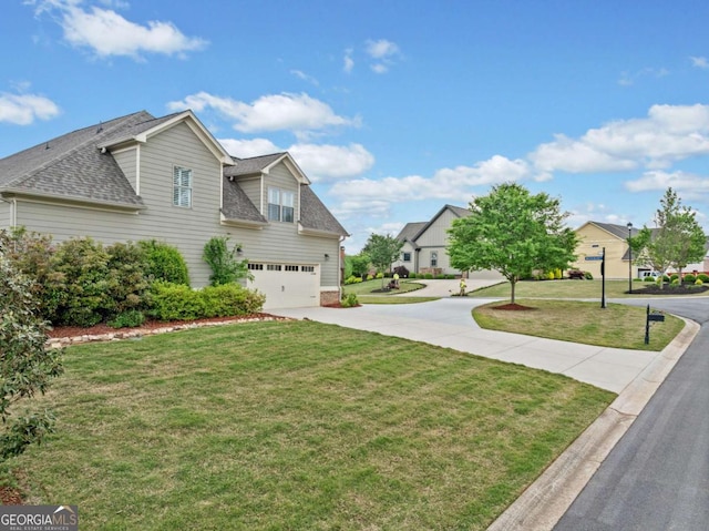 view of front of house featuring a garage, a front lawn, roof with shingles, and concrete driveway