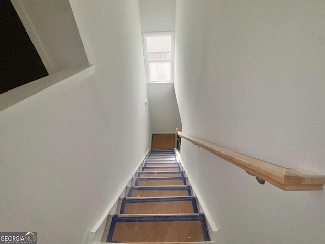 7252 Eton Ln, Locust Grove, GA 30248 - stairs featuring baseboards