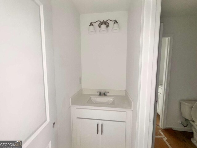 7252 Eton Ln, Locust Grove, GA 30248 - half bathroom with vanity and toilet