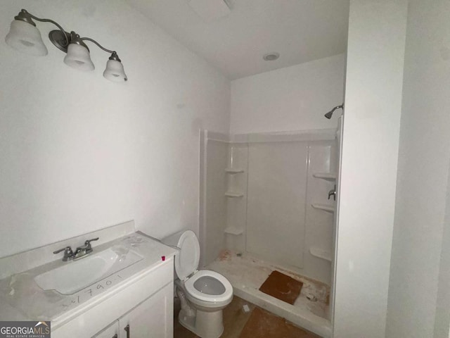 7252 Eton Ln, Locust Grove, GA 30248 - bathroom with toilet, a shower stall, and vanity