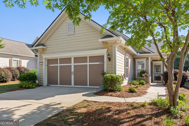 145 Begonia Ct, Griffin, GA 30223 - view of front of house featuring driveway and an attached garage