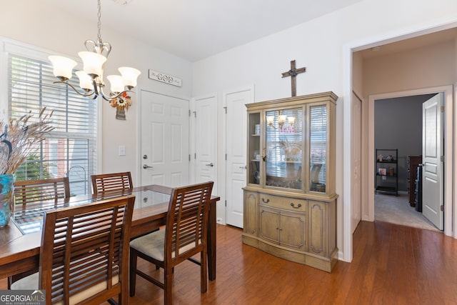 145 Begonia Ct, Griffin, GA 30223 - dining area featuring a chandelier and wood finished floors