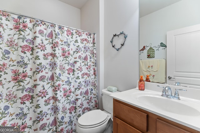 145 Begonia Ct, Griffin, GA 30223 - bathroom with toilet, vanity, and a shower with curtain