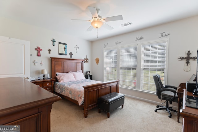 145 Begonia Ct, Griffin, GA 30223 - bedroom with a desk, light carpet, a ceiling fan, and baseboards