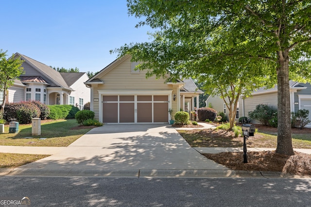 145 Begonia Ct, Griffin, GA 30223 - view of front of home with concrete driveway and a garage
