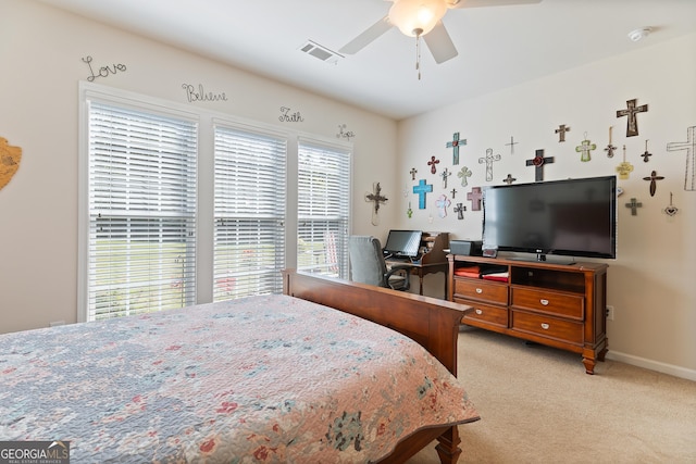 145 Begonia Ct, Griffin, GA 30223 - bedroom with light carpet, a desk, ceiling fan, and baseboards
