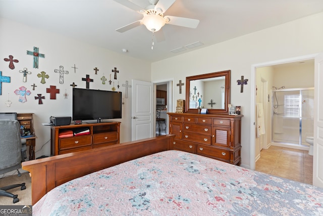 145 Begonia Ct, Griffin, GA 30223 - tiled bedroom with baseboards, a desk, a ceiling fan, and ensuite bath