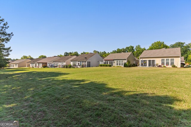 145 Begonia Ct, Griffin, GA 30223 - view of green lawn with a residential view