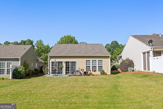 145 Begonia Ct, Griffin, GA 30223 - rear view of property with a yard, cooling unit, and a patio area