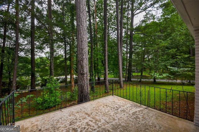view of patio featuring fence