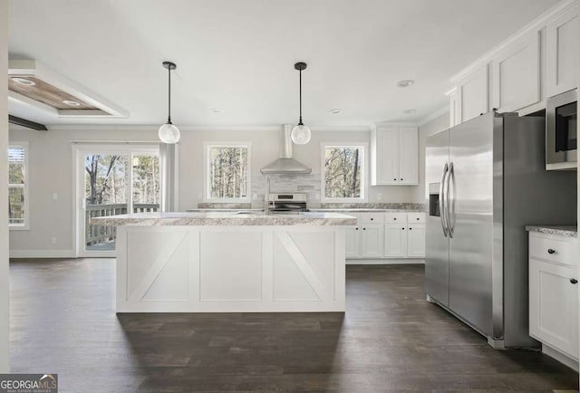 626 Candy Ln, Ellijay, GA 30540 - kitchen with wall chimney range hood, healthy amount of natural light, white cabinetry, appliances with stainless steel finishes, and ornamental molding